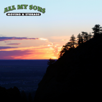 Sunset shines off the side of the Rocky Mountains