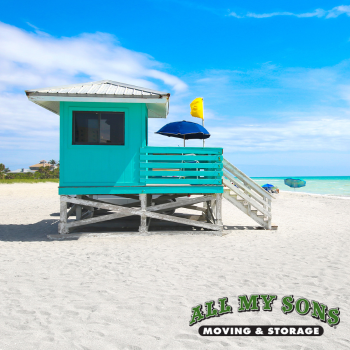 blue lifeguard station on riviera beach in florida