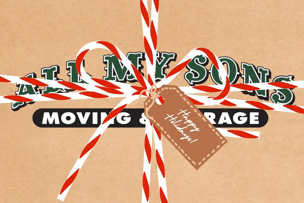 A festive holiday package featuring the All My Sons Moving and Storage Logo with a tag that says Happy Holidays.